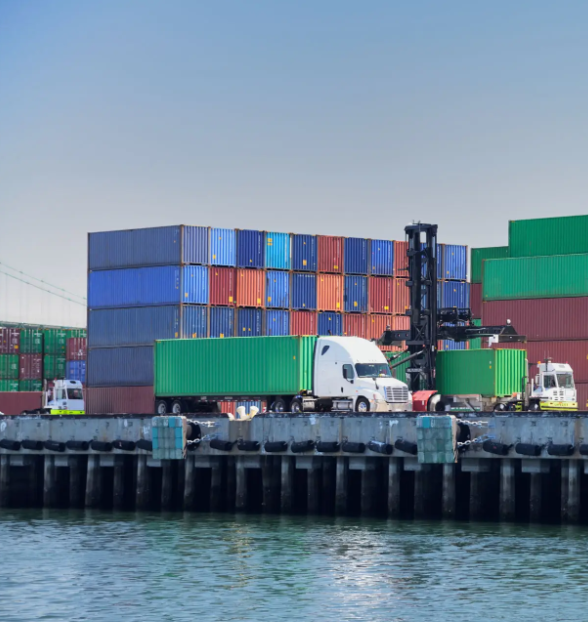 Port with containers and semi at pier